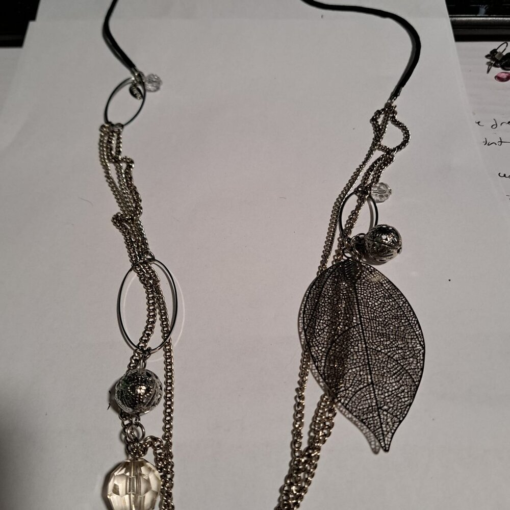 LBVYR extra long multistrand necklace with large metal leaf decoration and beads